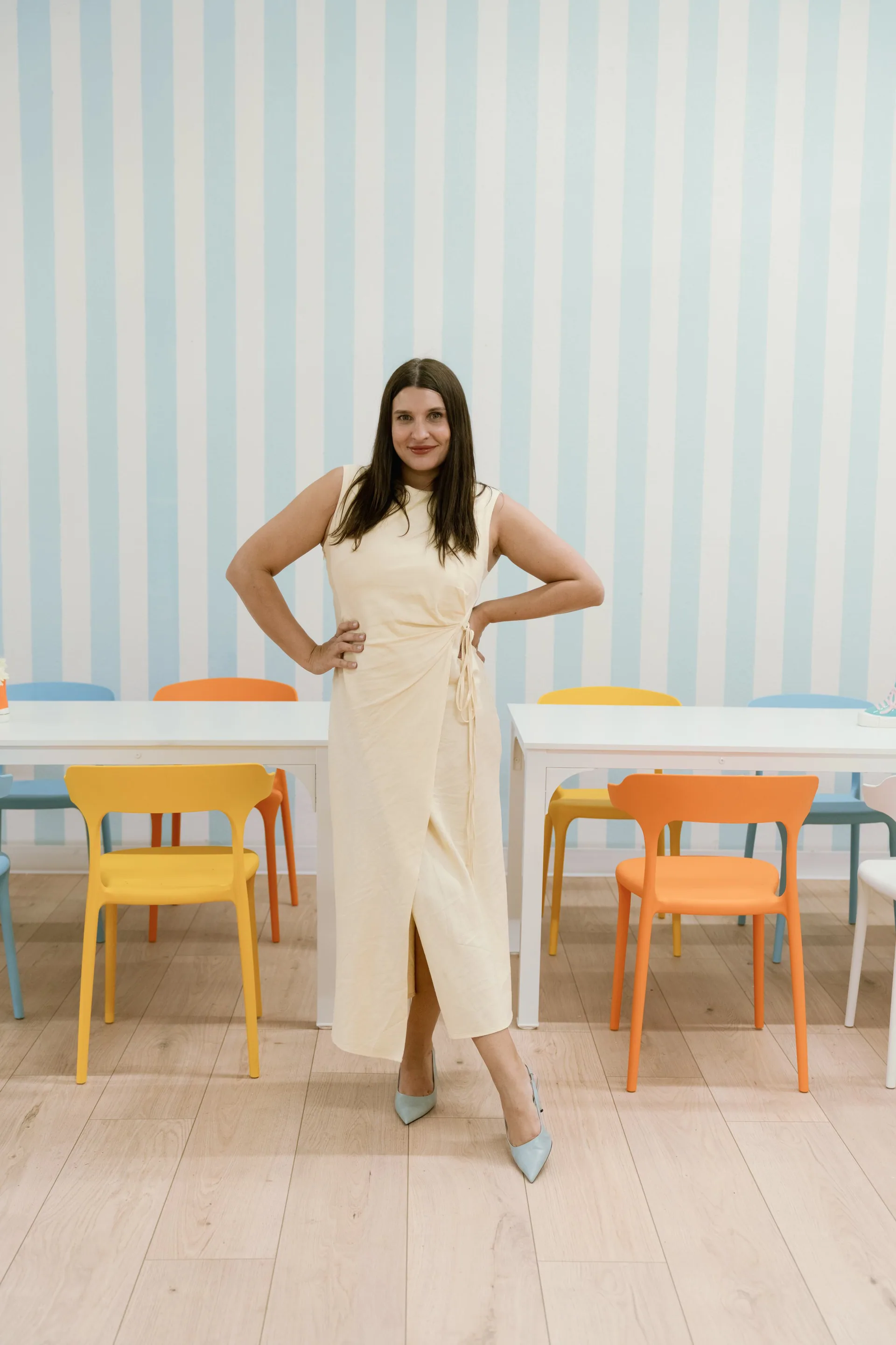 Maryana, the founder of Lulu, standing in the party room